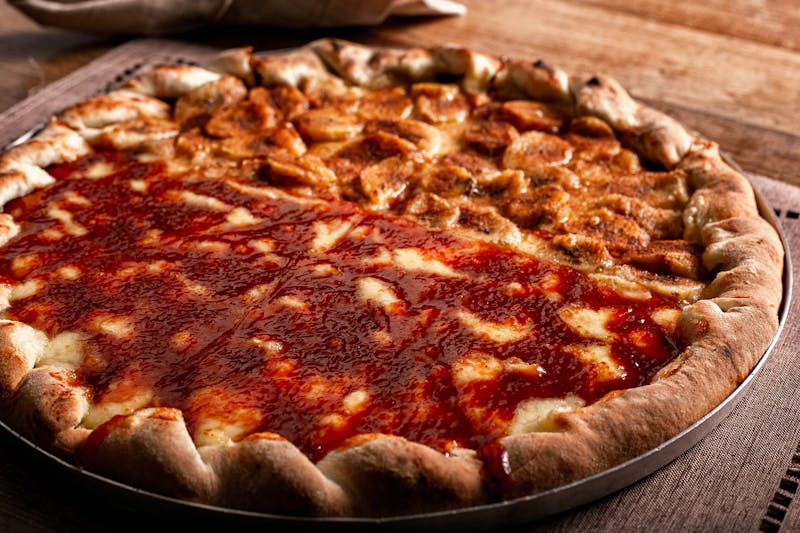 Four cheese pizza with golden melted cheese blend