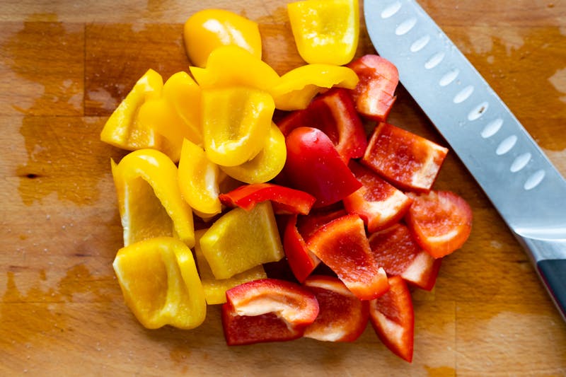 Colorful veggie supreme pizza loaded with fresh vegetables